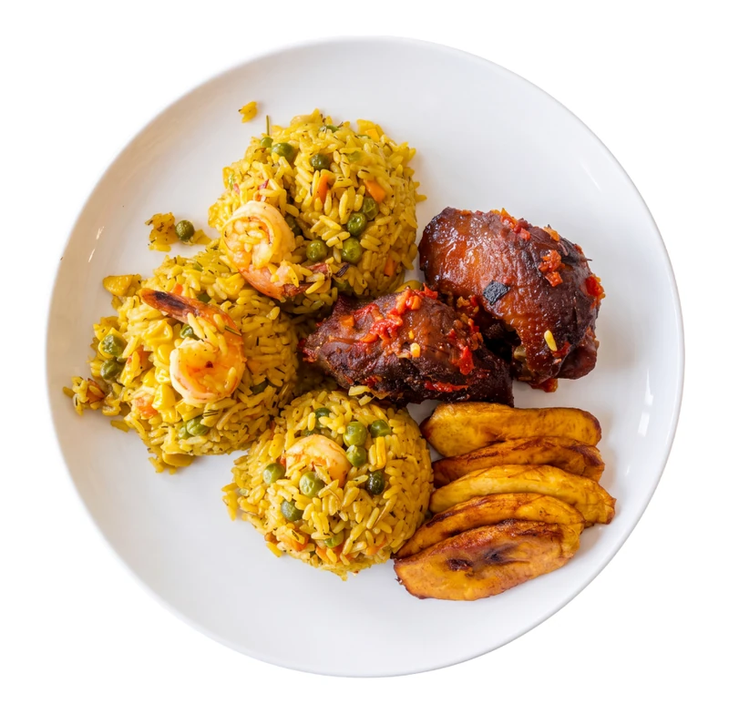 Nigerian fried rice with two proteins for takeout in Winnipeg